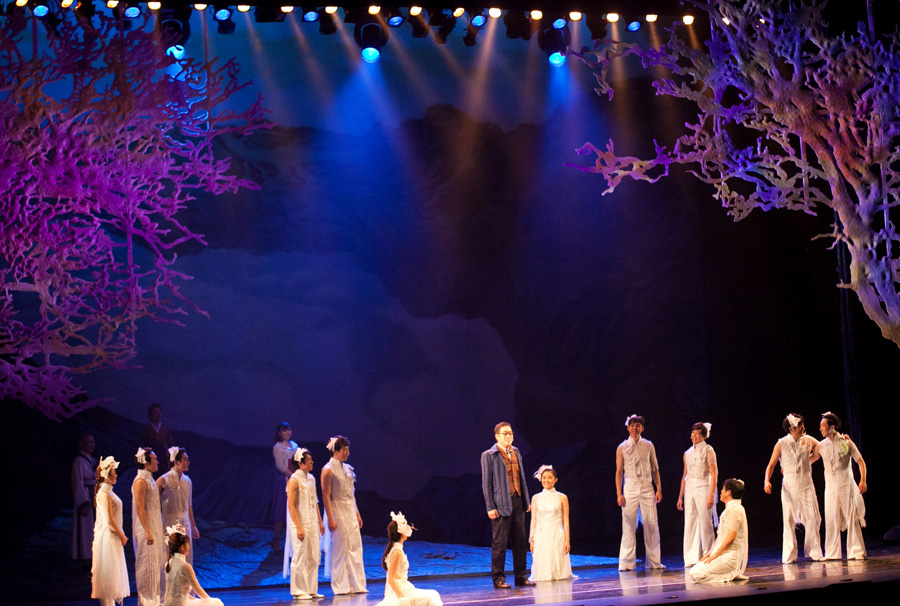 Actors and actresses perform in musical &apos;Dr. Butterfly&apos; at the Century Theater in Beijing, capital of China, June 27, 2014. &apos;Dr. Butterfly&apos; is a South Korean musical based on the life of Seok Joo-myung, a natural scientist who created the first complete map of Korean butterflies. Premiere of this musical in China, it is also one of the cultural exchange events aiming to greet the 22nd anniversary of the establishment of diplomatic relations between China and South Korea. [Photo/news.cn]